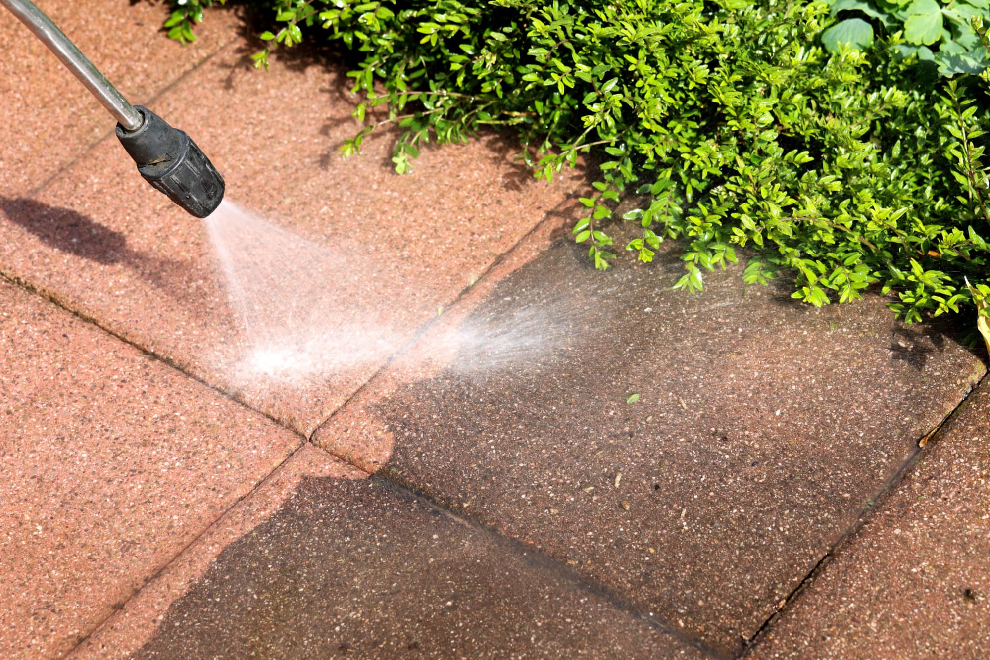 Pressure washing pavers