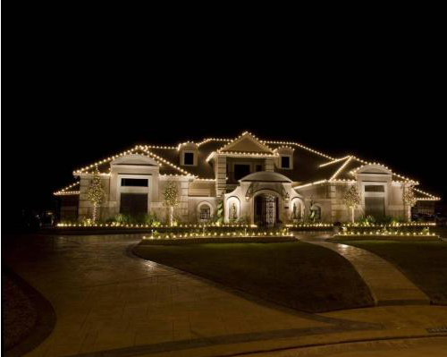 Home decorated with professional Christmas lights